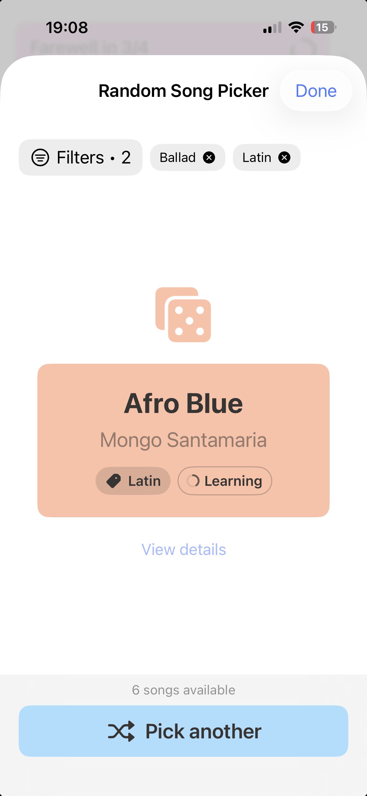 Random song picker with Ballad and Latin filters, suggesting Afro Blue by Mongo Santamaria